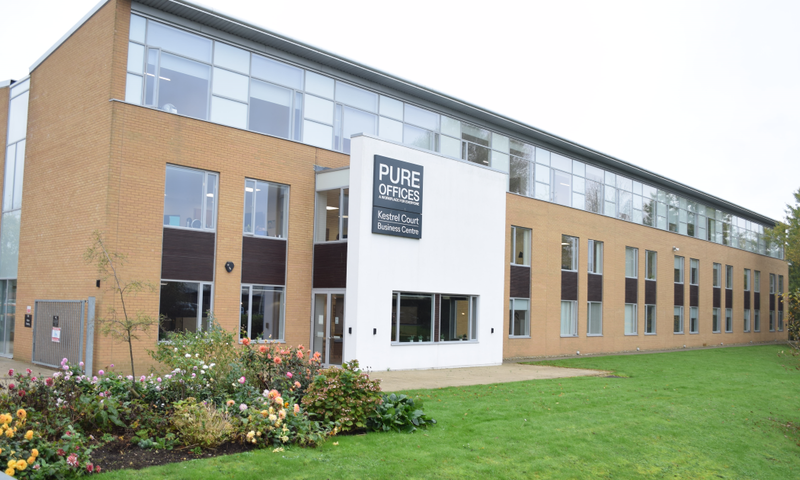A before shot of the building exterior before it was relandscaped