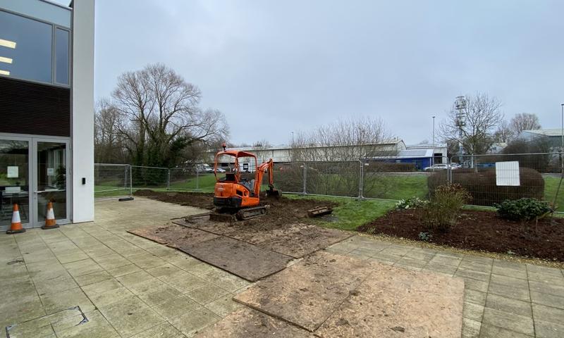 The ground being excavated during the landscape renovation